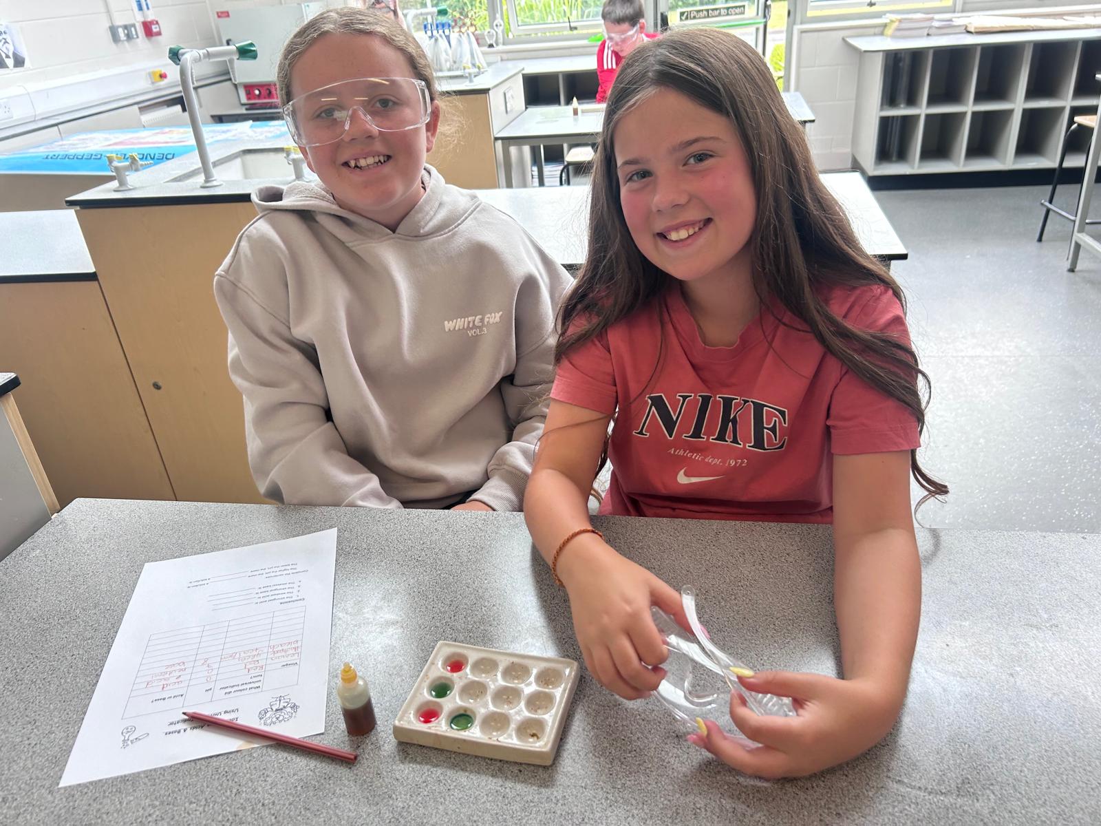Two students working together on a STEM activity
