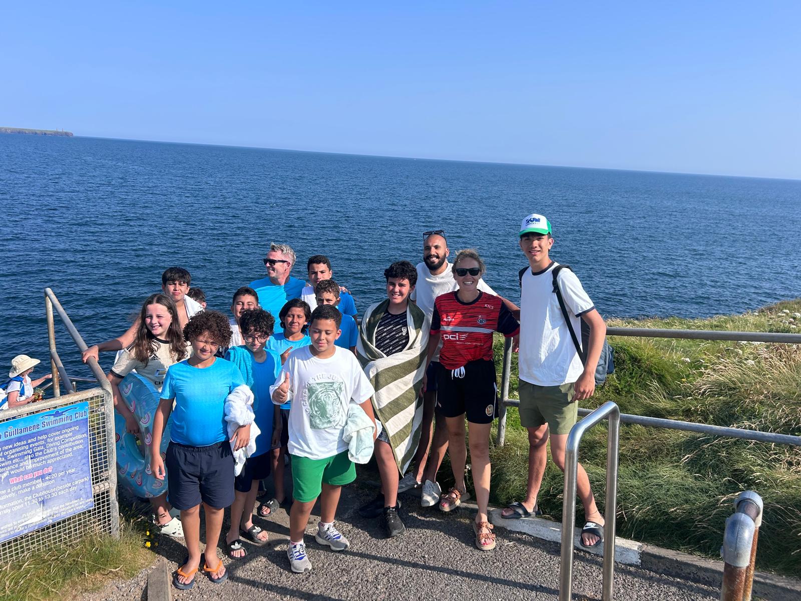 Students enjoying a coastal swim in Ireland